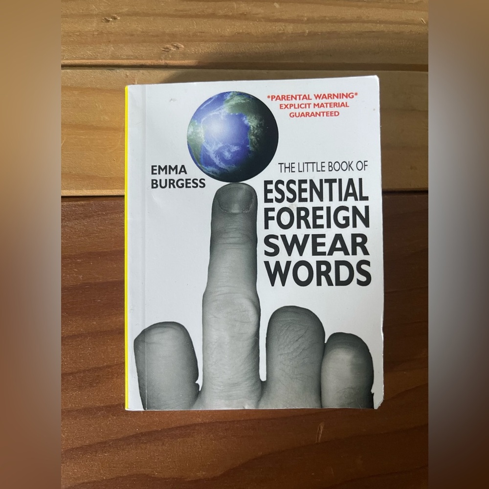 The Little Book of Essential Foreign Swear Words Paperback Emma Burgess 4x3x0.5”